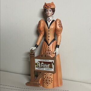 #22.Avon Figurine in Peach Dress